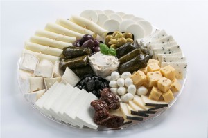 chees plate with olives and dry tomato