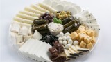 chees plate with olives and dry tomato